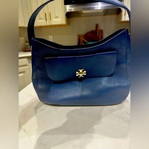 Tory Burch over the shoulder cobalt blue handbag. With gold monogram.  Authentic